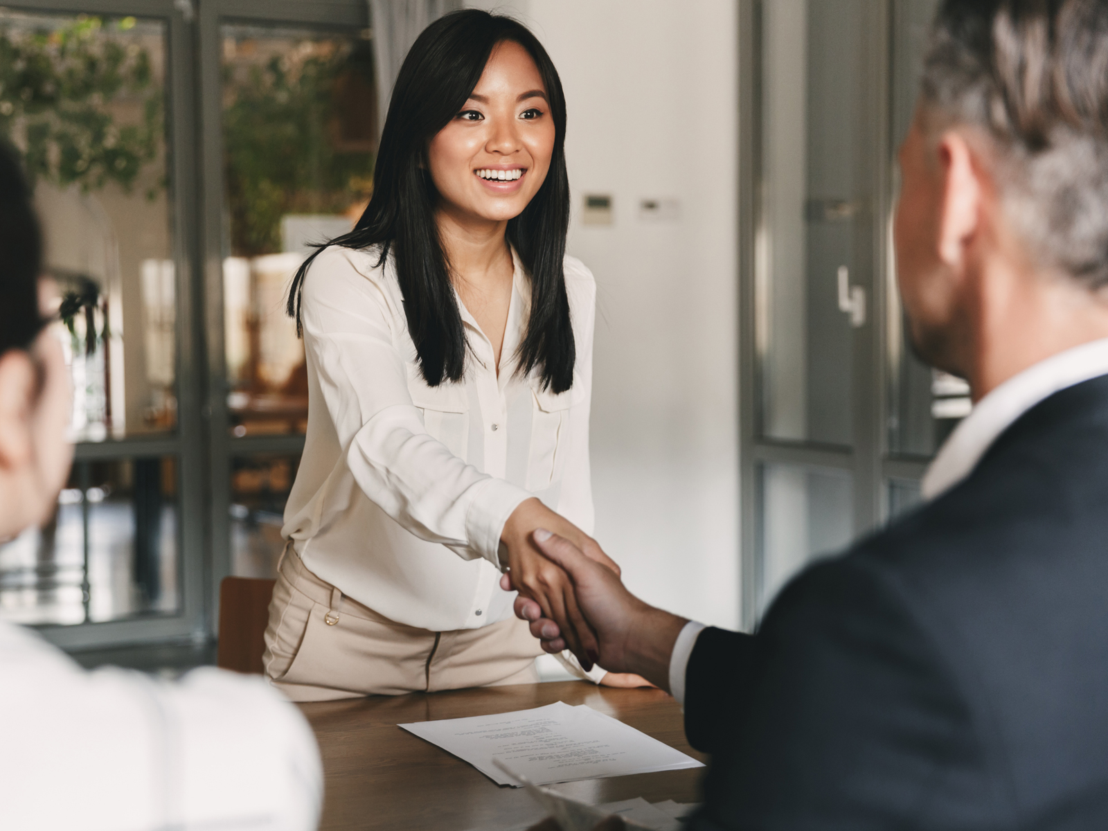 woman shaking hands